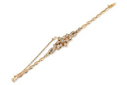 A DIAMOND AND GOLD BRACELET