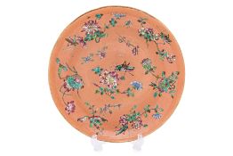 A FAMILLE ROSE CORAL GROUND DINNER PLATE
