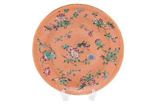 A FAMILLE ROSE CORAL GROUND DINNER PLATE