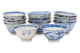 A GROUP OF BLUE AND WHITE TEA CUPS