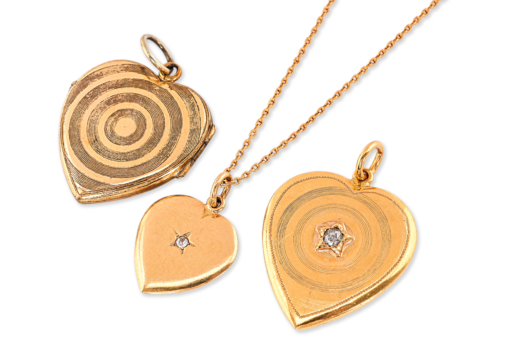 A GROUP OF HEART-SHAPED PENDANTS