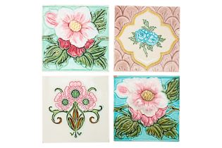 A GROUP OF FOUR FLORAL DESIGN TILES