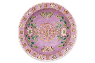 A PINK GROUND FAMILLE ROSE 'IN AND OUT' 'BUTTERFLY' BOWL