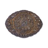 A LARGE REPOUSSE SILVER GILT BUCKLE