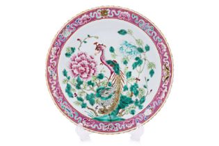 A FAMILLE ROSE WHITE GROUND DINNER PLATE