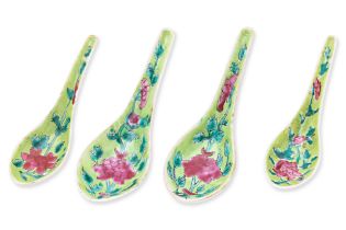 A GROUP OF FOUR LIME GREEN GROUND FAMILLE SPOONS