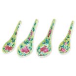 A GROUP OF FOUR LIME GREEN GROUND FAMILLE SPOONS