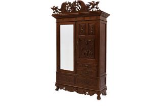 A CARVED TEAK WARDROBE