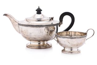 AN ENGLISH SILVER TEAPOT AND SUGAR BOWL