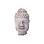 A STONE HEAD OF BUDDHA