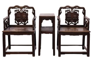 A PAIR OF HARDWOOD ARMCHAIRS WITH SIDE TABLE