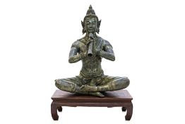 A LARGE THAI BRONZE FIGURE OF A SEATED MUSICIAN