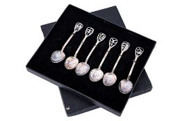 A SET OF SIX AUSTRALIAN ARTS AND CRAFTS SILVER COFFEE SPOONS