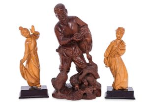 A GROUP OF THREE CHINESE CARVED WOOD FIGURES