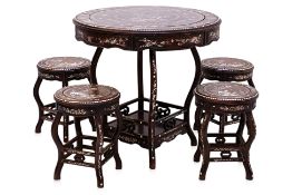A MOTHER OF PEARL INLAID HARDWOOD TABLE AND FOUR STOOLS