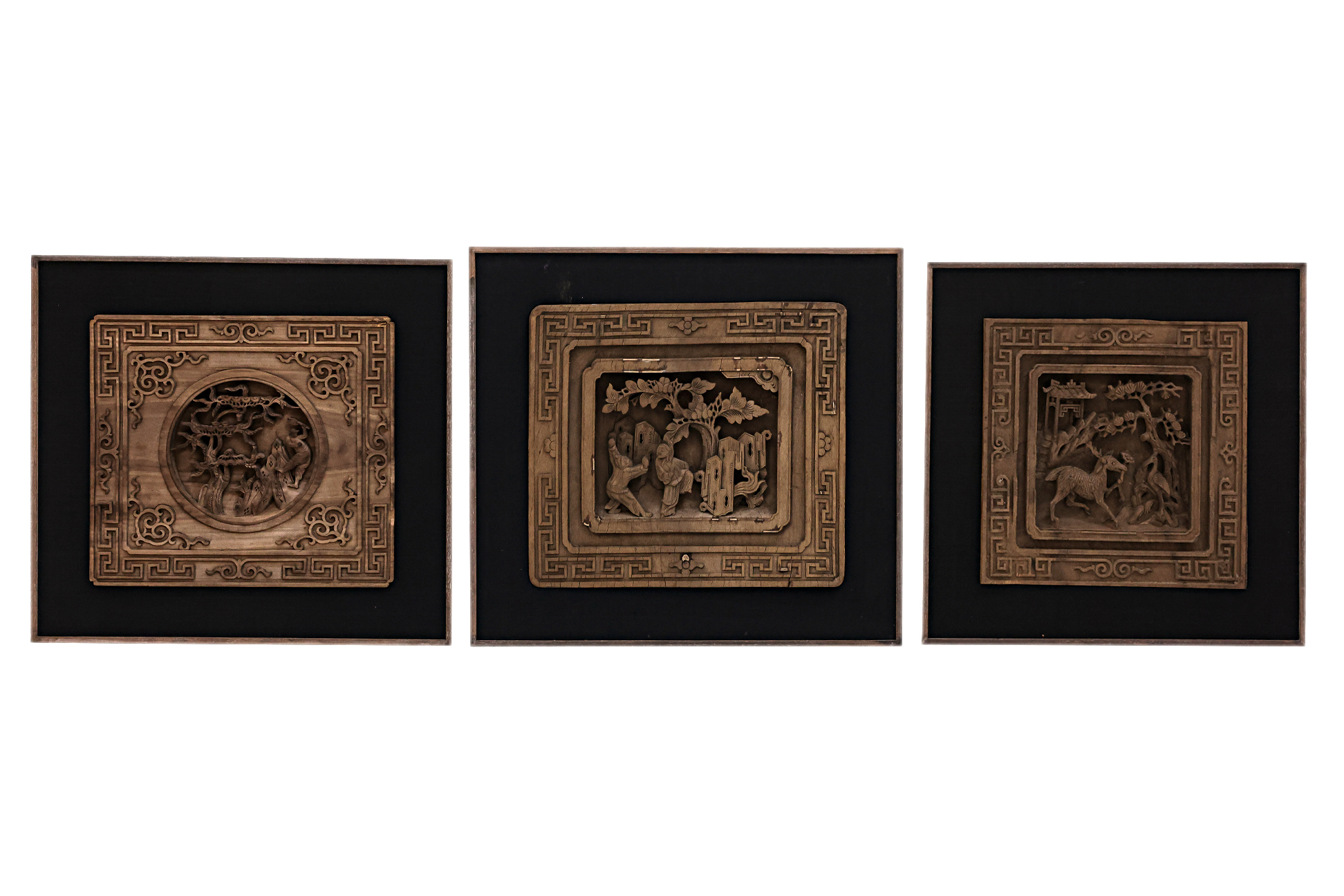 A GROUP OF THREE WOOD CARVED WALL PANELS