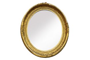 A 19TH CENTURY OVAL GILT MIRROR