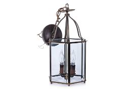 A PAUL FERRANTE BRASS HANGING LANTERN