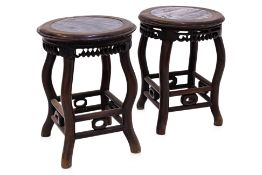 A PAIR OF MARBLE INSET HARDWOOD STOOLS