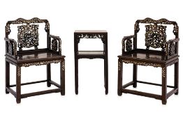 A PAIR OF MOTHER OF PEARL HARDWOOD ARMCHAIRS WITH SIDE TABLE