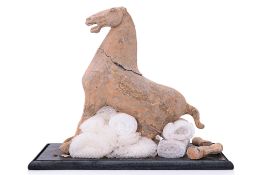 A TANG TYPE POTTERY MODEL OF A HORSE (FOR RESTORATION)