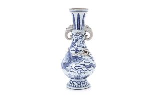 A BLUE AND WHITE DRAGON VASE