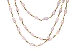A LONG KESHI PEARL STRAND NECKLACE