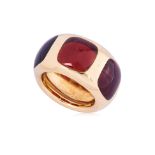 A THREE STONE GARNET 'BISANZIO' RING BY POMELLATO