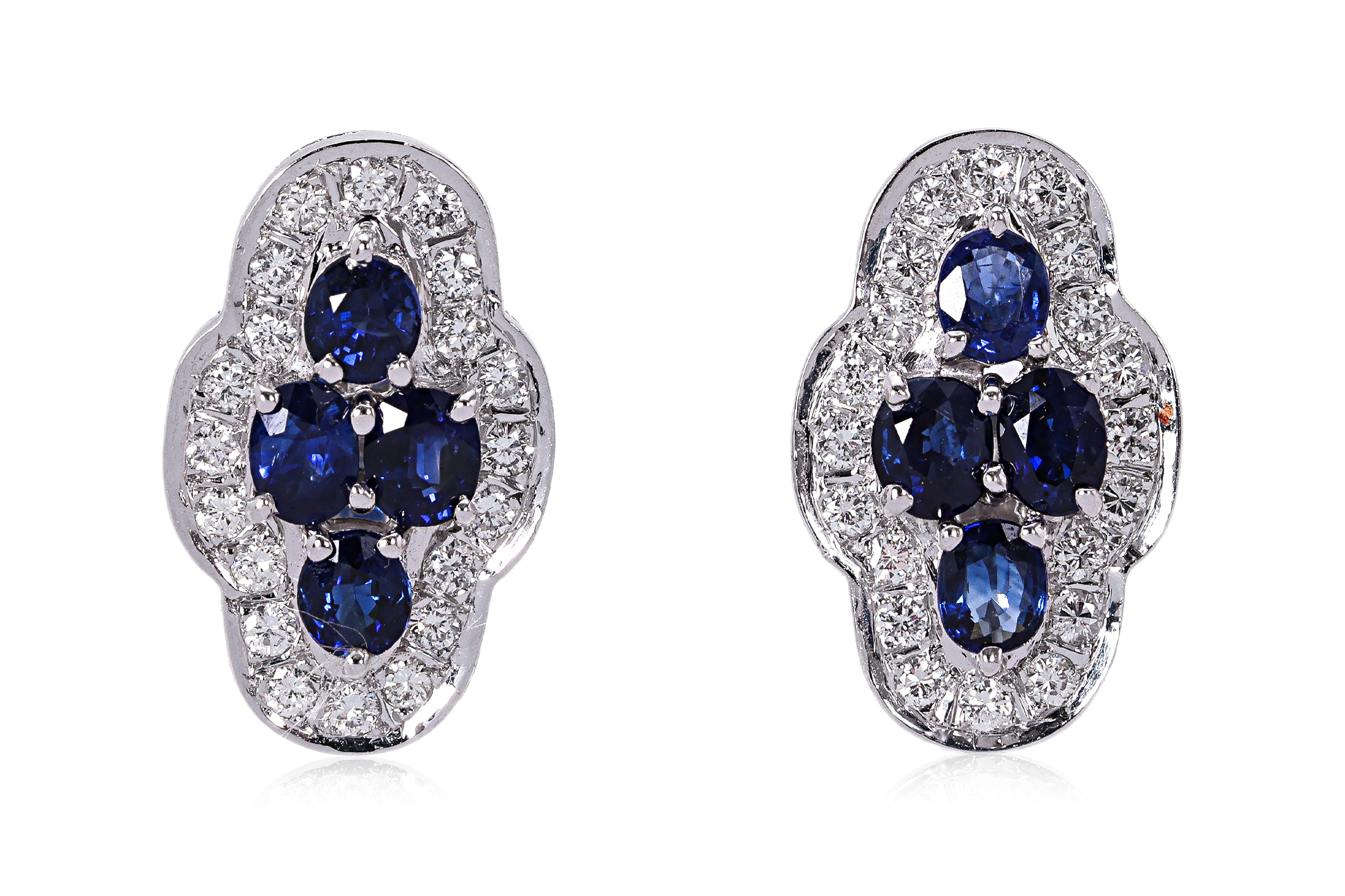 A PAIR OF SAPPHIRE CLUSTER AND DIAMOND EARRINGS