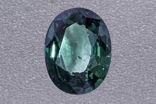 AN UNHEATED GREEN SAPPHIRE LOOSE GEM