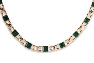 A FACETED JADE NECKLACE