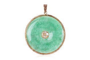 A JADE DISC PENDANT