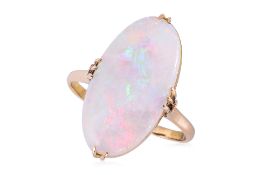A WHITE OPAL AND YELLOW GOLD RING