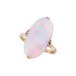 A WHITE OPAL AND YELLOW GOLD RING