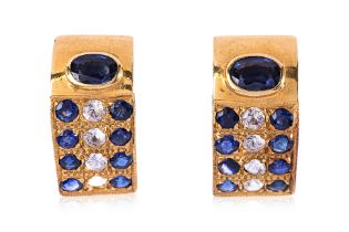 A PAIR OF BLUE AND WHITE SAPPHIRE STUD EARRINGS