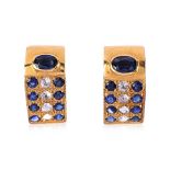 A PAIR OF BLUE AND WHITE SAPPHIRE STUD EARRINGS