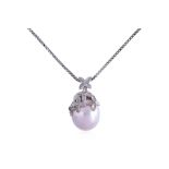 A CULTURED SOUTH SEA PEARL PENDANT ON CHAIN