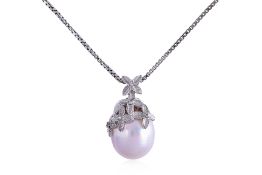 A CULTURED SOUTH SEA PEARL PENDANT ON CHAIN
