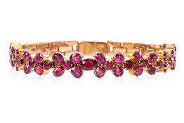 A RUBY AND GOLD BRACELET