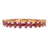 A RUBY AND GOLD BRACELET