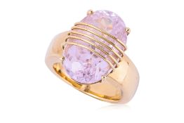 A LARGE KUNZITE AND GOLD RING