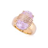 A LARGE KUNZITE AND GOLD RING