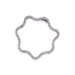 A DIAMOND 'WAVY' TENNIS BRACELET