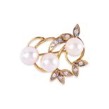 A CULTURED SOUTH SEA PEARL AND WHITE SAPPHIRE BROOCH