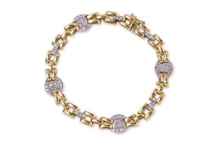 AN ITALIAN MADE DIAMOND AND TWO TONE GOLD BRACELET