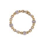 AN ITALIAN MADE DIAMOND AND TWO TONE GOLD BRACELET