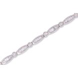 A DIAMOND AND WHITE GOLD BRACELET