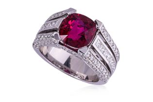 A FINE UNHEATED MOZAMBIQUE RUBY AND DIAMOND RING
