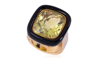 A LARGE LEMON QUARTZ AND ONYX RING