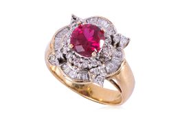 A SYNTHETIC RUBY AND DIAMOND RING